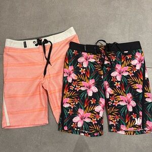 Two Hurley bathing suit shorts